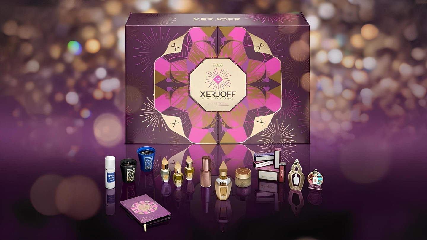 Purple and gold beauty advent calendar box with a geometric pink and gold design